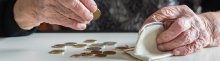 person counting coins